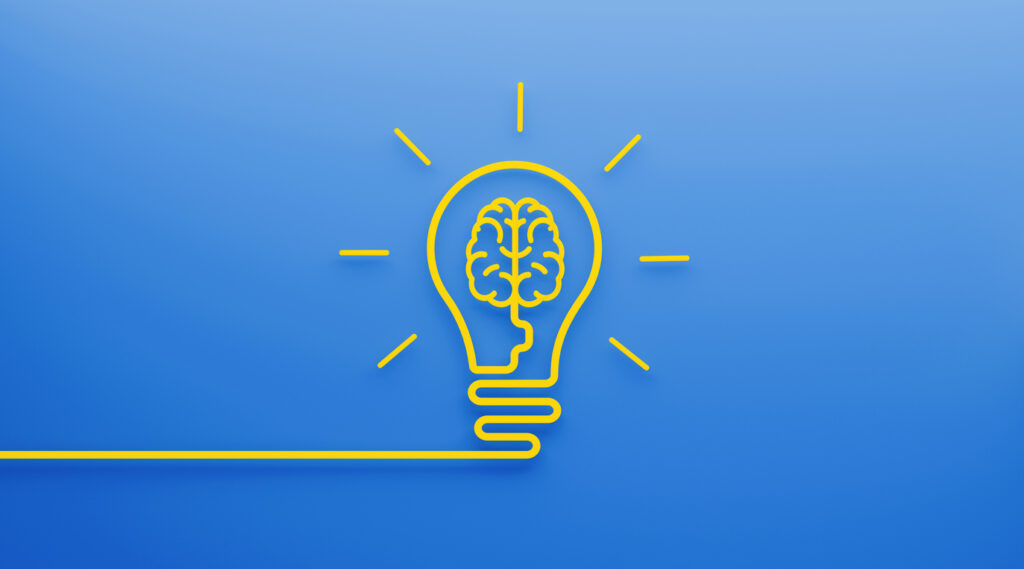 Brain Shape Inside A Light Bulb on Blue Background